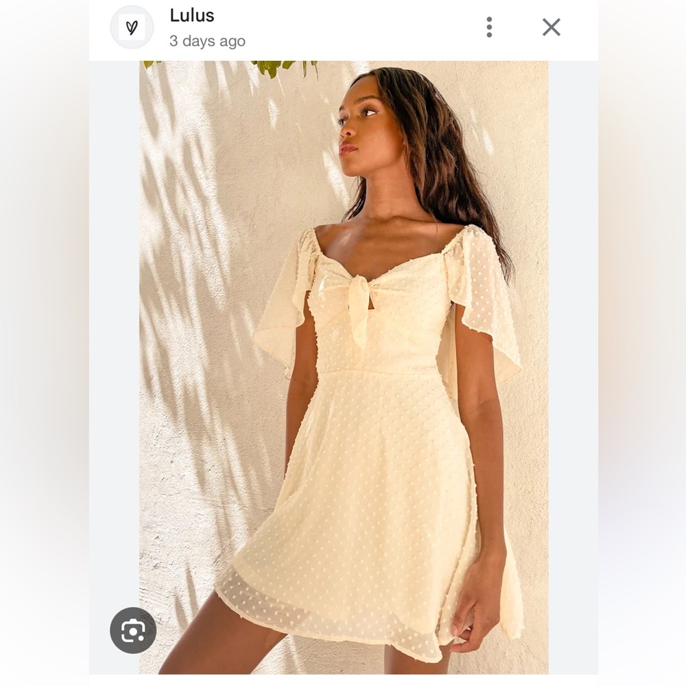 Lulu's Be a Dear Cream Swiss Dot Tie-
Front Skater Dress